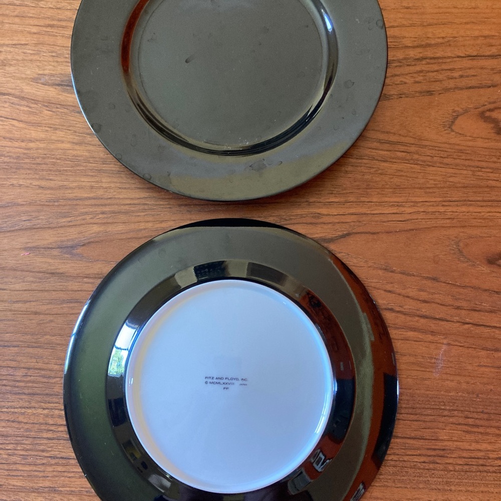 8 Black fine China dinner plates. Fitz and Floyd brand.